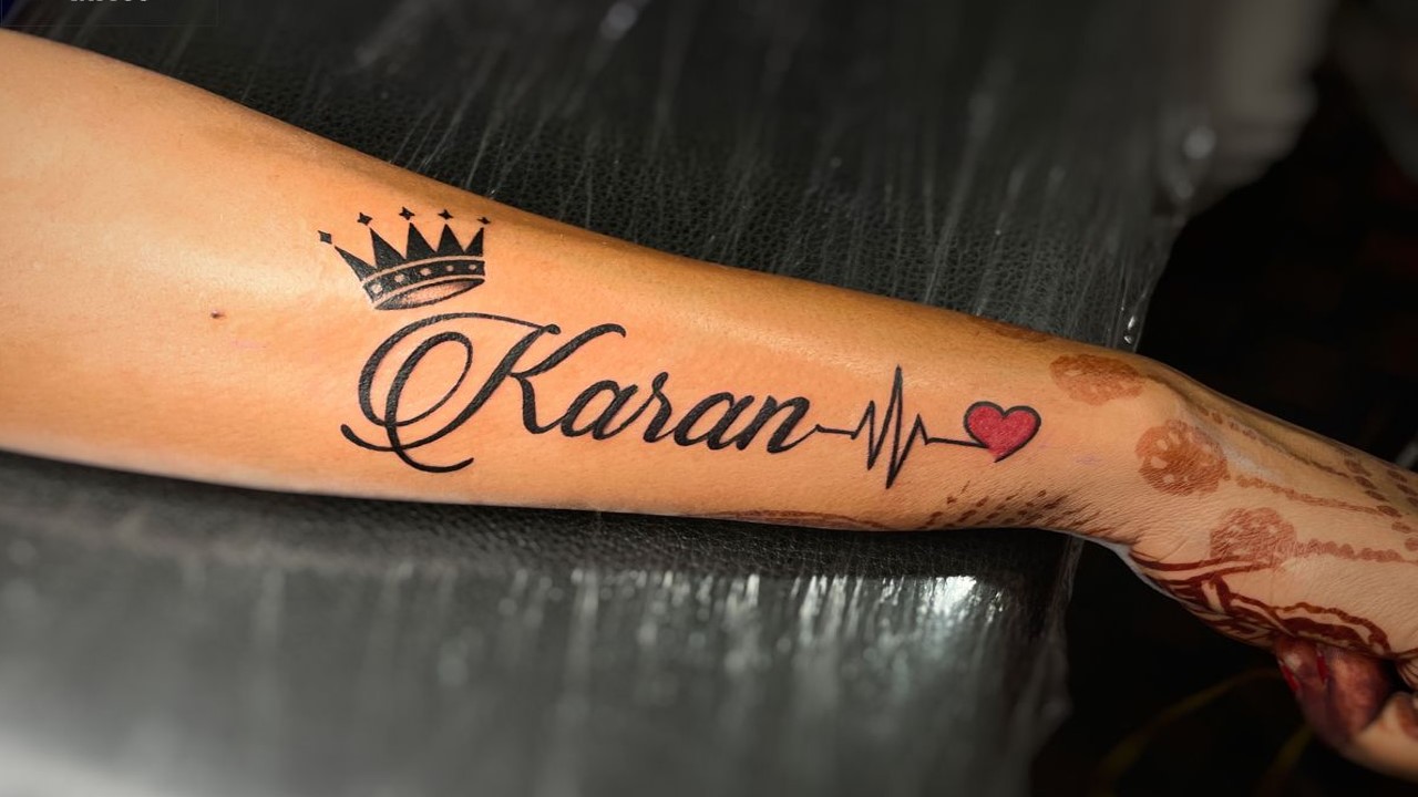 Name tattoo with crown by RJ Tattoos  Name tattoo on hand Name tattoos  for moms Name with crown tattoo