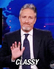 GIF of a man sarcastically saying "classy" with a thumbs up
