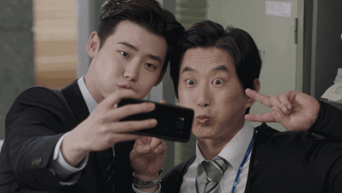 Jung Jae-Chan taking a funny selfie with his colleague Mr. Choi